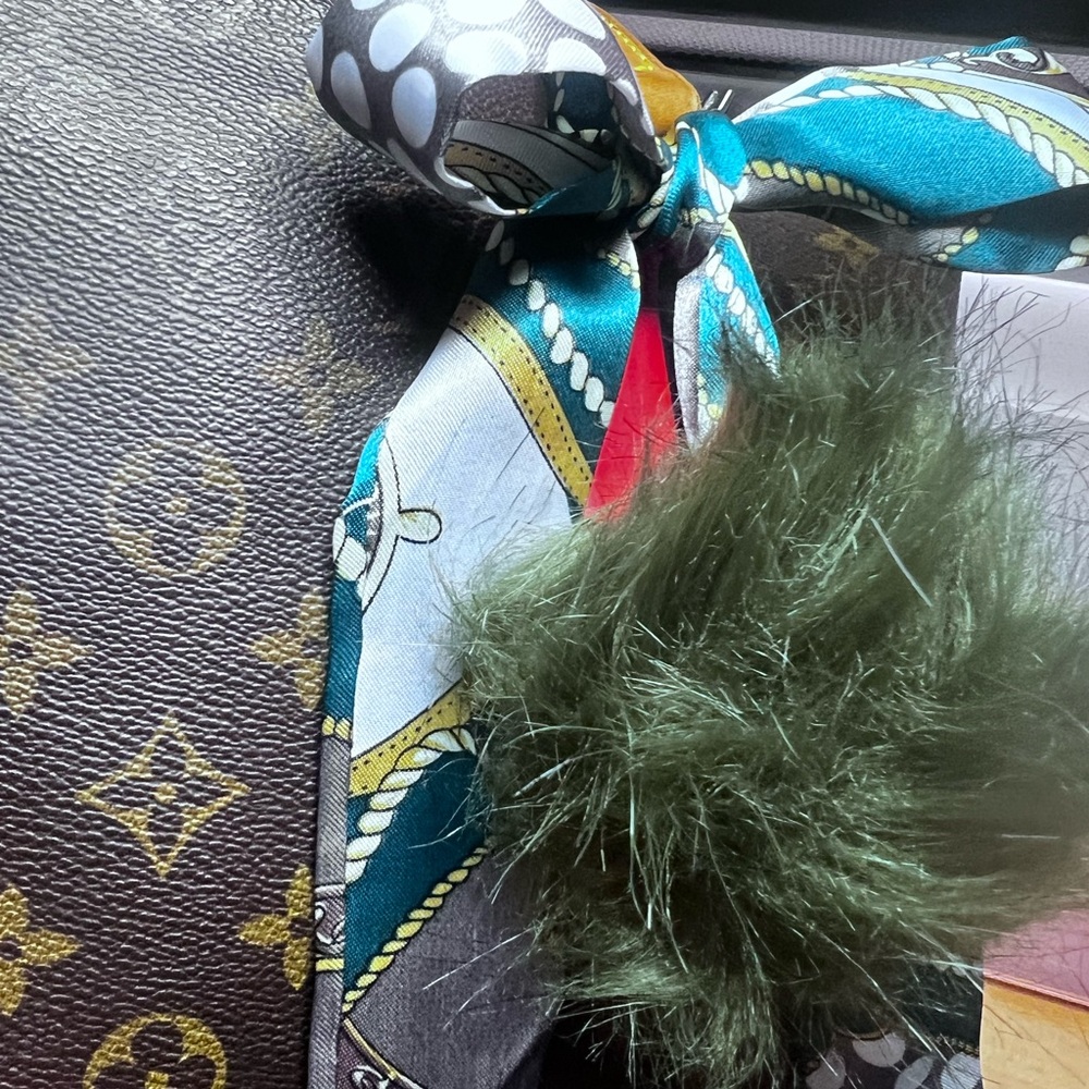 Fashion Green and Red ribbon 🎀 and fluffy bag accessory.